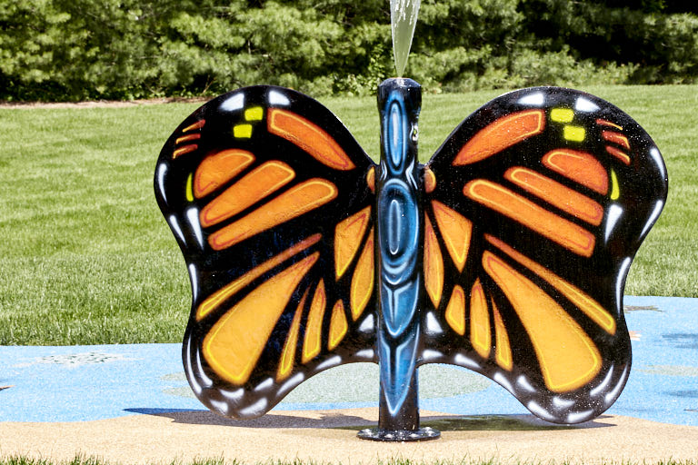 Butterfly water play features. Manufactured by My Splash Pad in the USA. American-made by an American-owned company. Focus card image.